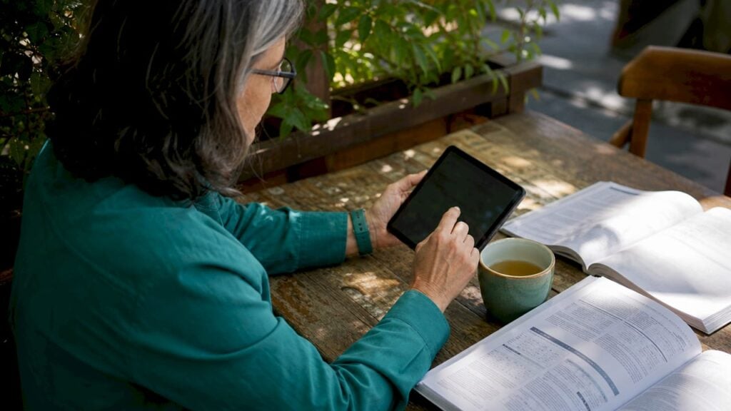 Specialist interacting with digital identity wallet tablet