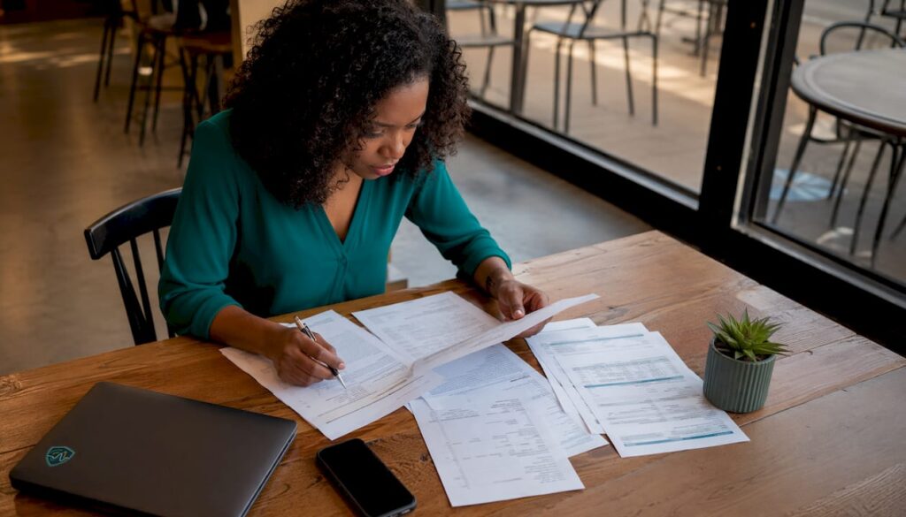 Woman reviewing bank identity documents