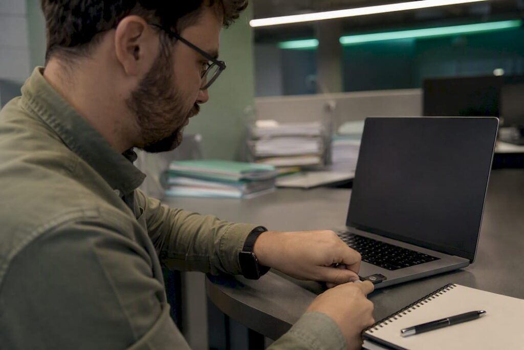 Hands inserting security key for identity control