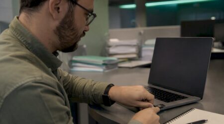 Hands inserting security key for identity control