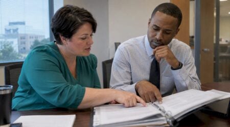 Examiner reviewing identity theft program controls