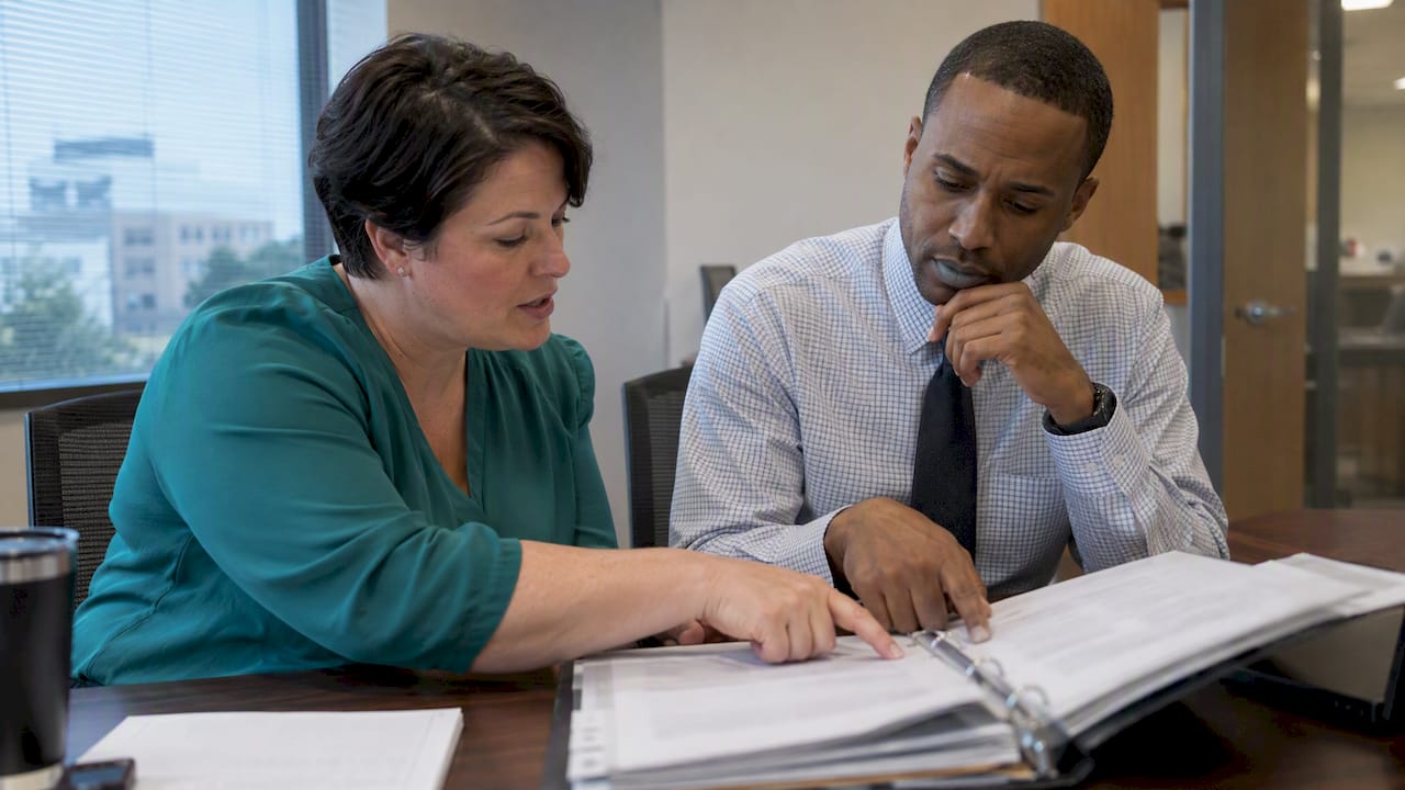 Examiner reviewing identity theft program controls