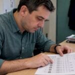 Analyst comparing face test report tables
